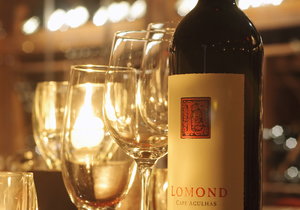 Bottle of Lamond wine with glass of wine standing next to it